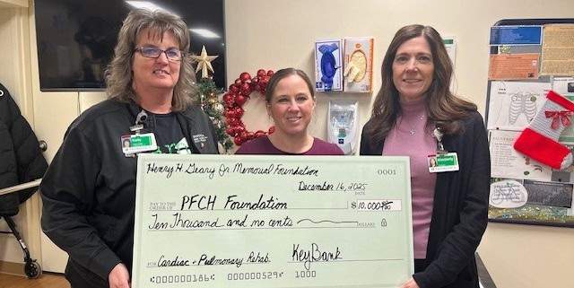 Detailed charity check presentation in Fostoria for medical fundraisers.
