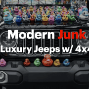 Modern Junk Jeep decorated with colorful rubber ducks in an indoor shopping mall parking lot.