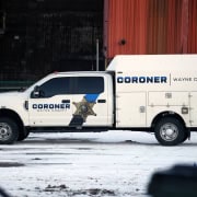 1. Police coroner vehicle Wayne County, crime scene investigative truck.