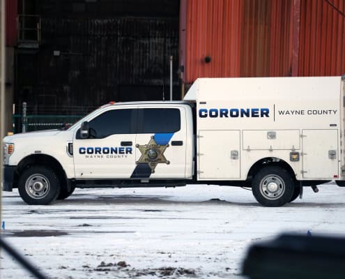 1. Police coroner vehicle Wayne County, crime scene investigative truck.