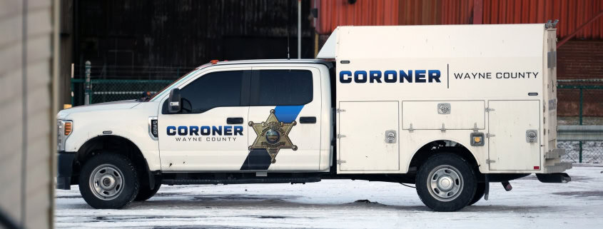 1. Police coroner vehicle Wayne County, crime scene investigative truck.