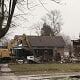 - Excavator demolishing house in Fostoria Ohio, construction, renovation, destruction, local news.