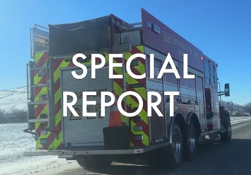 Fire truck on snowy roadside in Fostoria, Ohio, during an emergency response.