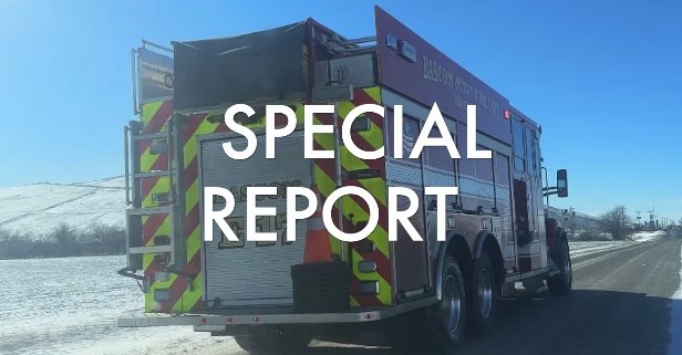 Fire truck on snowy roadside in Fostoria, Ohio, during an emergency response.