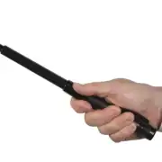 Wireless police baton communication device in hand for security and law enforcement.