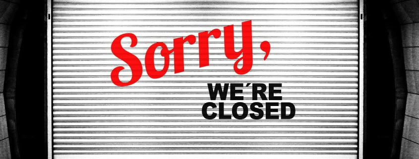 Closed business sign, storefront shutter, local news closure, Fostoria Free Press.
