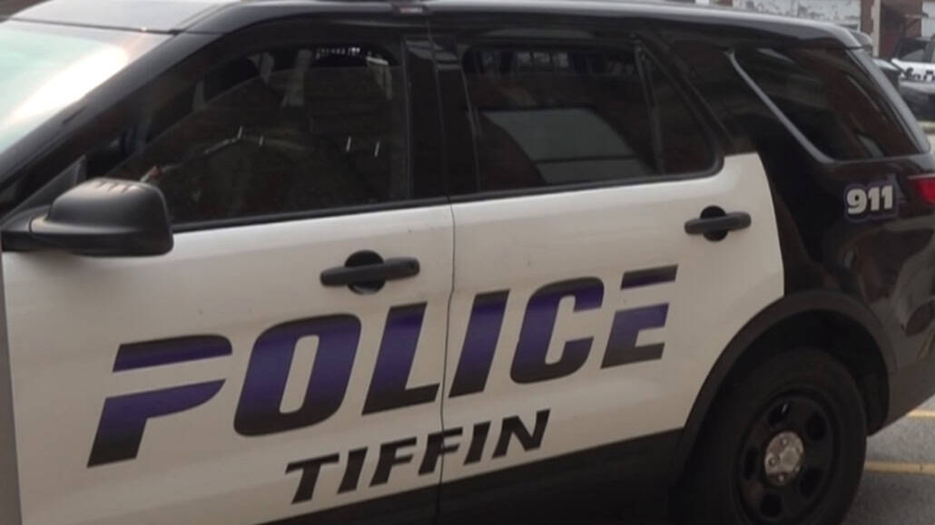 Police car in Tiffin, Ohio, with official markings and emergency lights, used for local law enforcement.