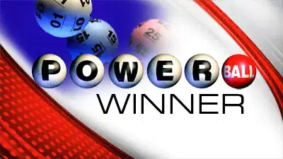 Powerball winning ticket celebration in Fostoria, Ohio, showcasing lottery success.
