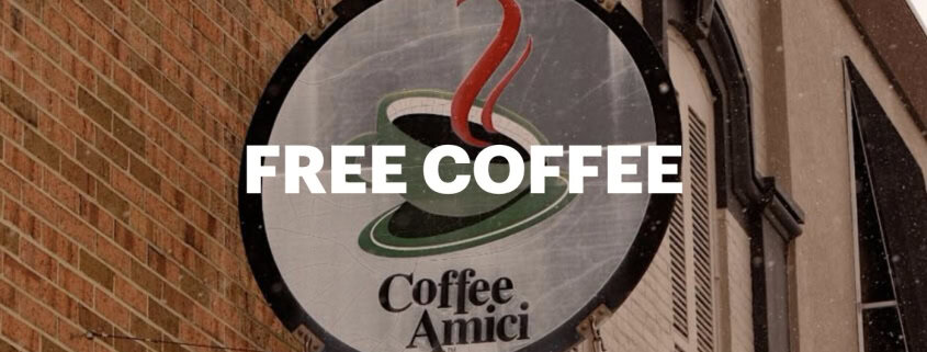 Fostoria News Coffee Amici sign offering free coffee to community members.