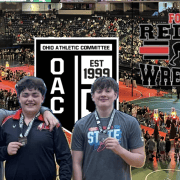 Young wrestlers celebrate their success at the Fostoria Pride on the Mat event.