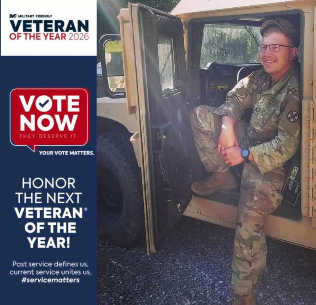 Fostoria News U.S. Army veteran Bryan Bills in uniform sitting in military vehicle.