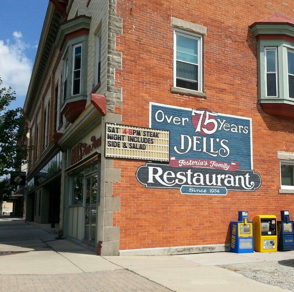 Historic brick building housing Deli's Restaurant in Fostoria, Ohio.