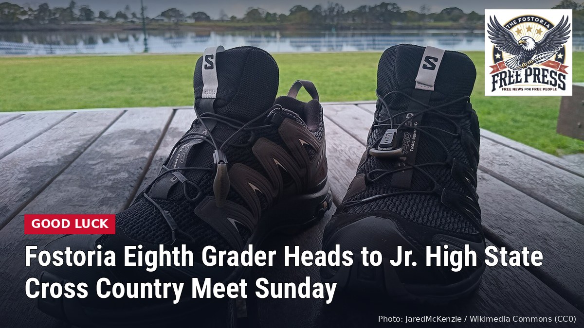 Fostoria News: a pair of trail running shoes on a wooden deck beside a park lawn, with the headline: Fostoria Eighth Grader Heads to Jr. High State Cross Country Meet Sunday