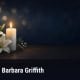 Fostoria News Memorial candle with white lilies for Barbara Griffith obituary.