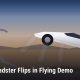 Fostoria News Tesla Roadster flying in a demo with desert background.