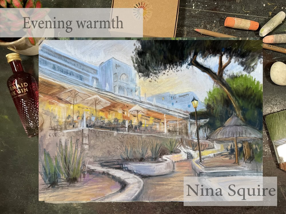 Soft pastel painting of a restaurant with outdoor cafe and trees at sunset.
