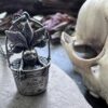 Sterling silver mandrake pendant from The Wicked Griffin