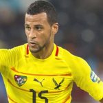 Joueur togolais portant maillot jaune lors d'un match.