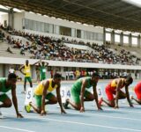 Athlètes togolais au départ d'une course de sprint lors du Championnat National d'Athlétisme au Stade de Kégué à Lomé.