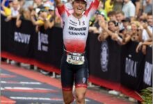 Julie Derron at the finish in Kona