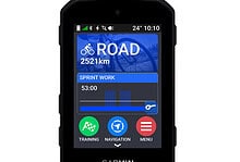 Garmin cycling GPS device displaying road route, distance, and training data for triathlon preparation.