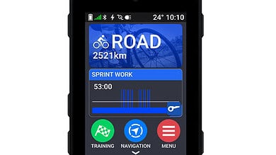 Garmin cycling GPS device displaying road route, distance, and training data for triathlon preparation.