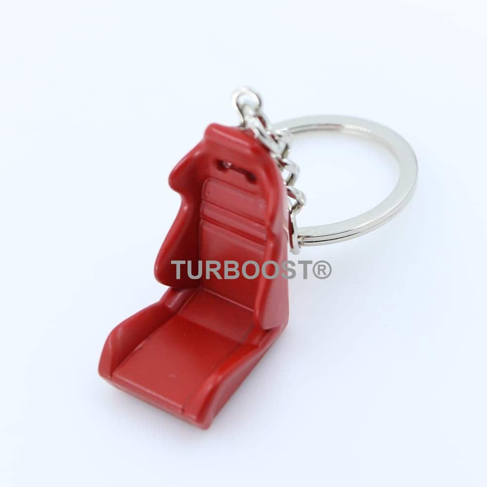 A detailed red racing car bucket seat keychain made from alloy.