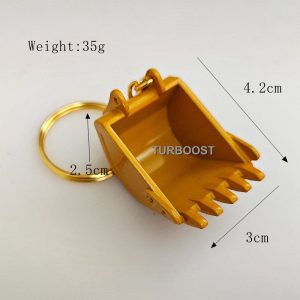 Yellow alloy excavator bucket keychain with a metal ring