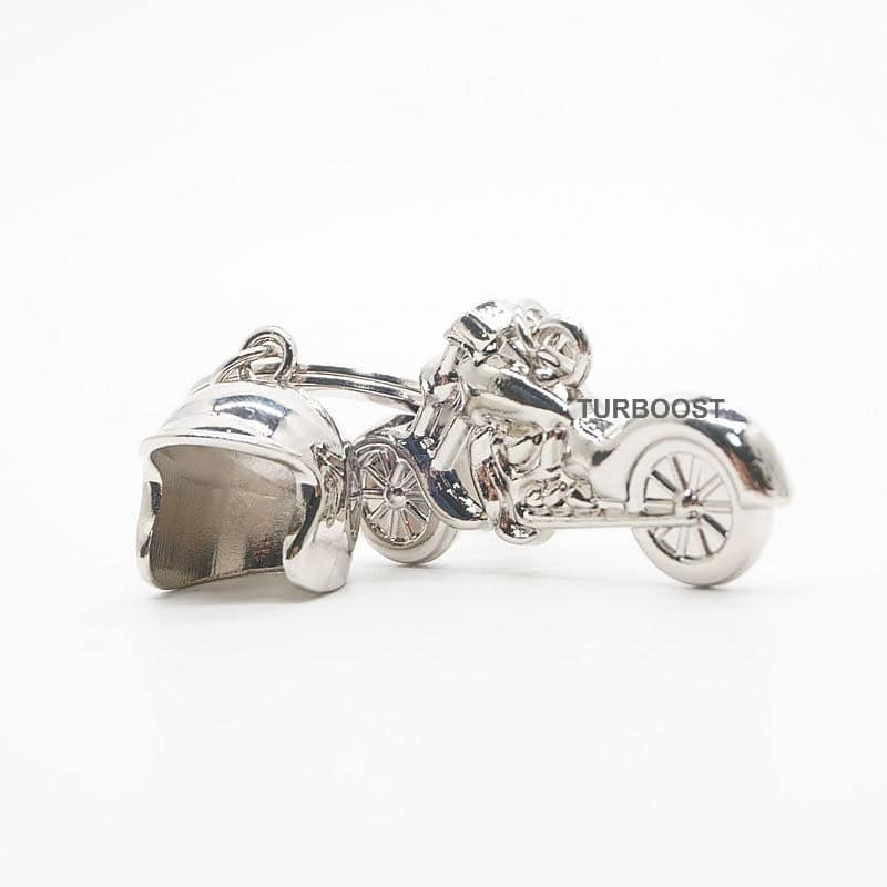 A silver-colored alloy keychain featuring a detailed motorcycle and helmet charm.