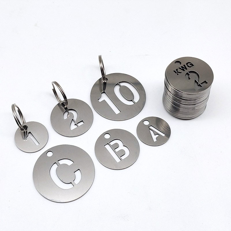 Four round stainless steel hollow number plates of different sizes, featuring numbers 1, 2, 10, and C,B,A, each with a keyring.