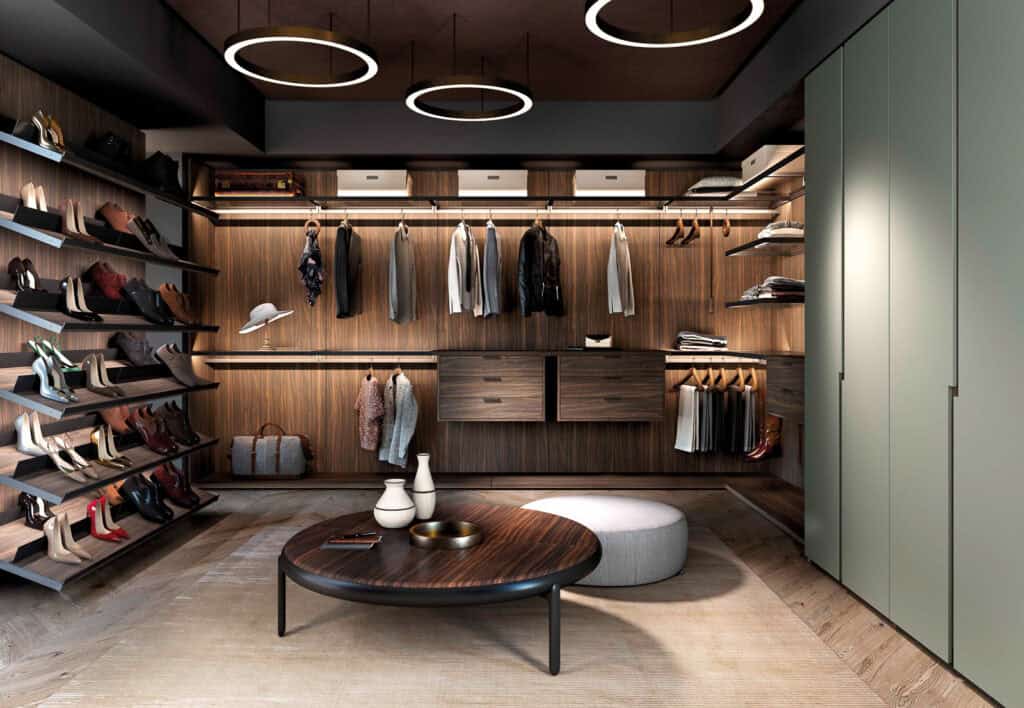 Luxurious walk-in closet featuring organized shelves, hanging space, and contemporary design element.