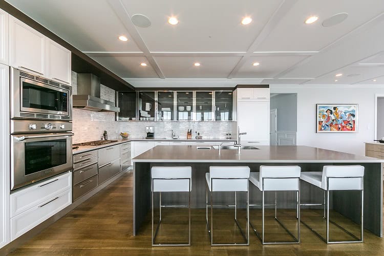 Urban Homes traditional kitchen with sleek design and contemporary appliances.