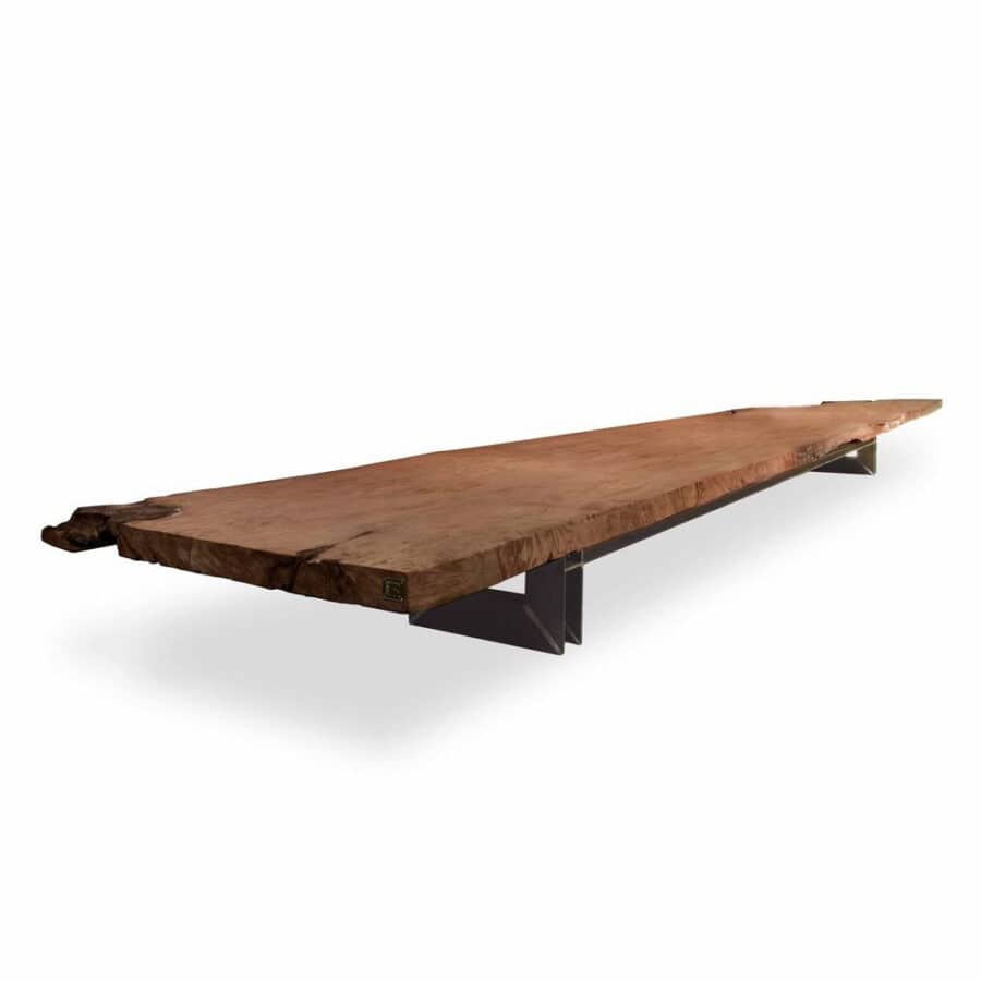 Wooden urban home table with modern metal supports for outdoor seating.