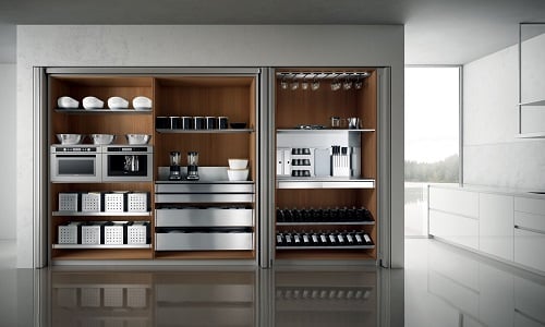 Urban kitchen with wooden cabinetry, stainless steel appliances, and organized storage in a contempo.