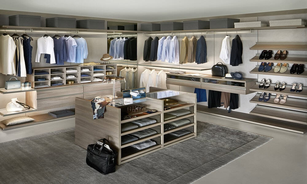 Modern clothing store interior with organized apparel displays and accessories.