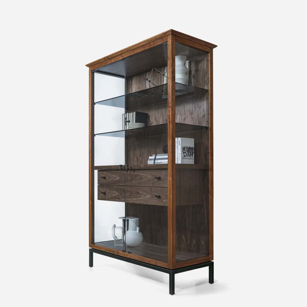 Elegant wooden display cabinet with glass doors, ideal for contemporary urban living spaces.
