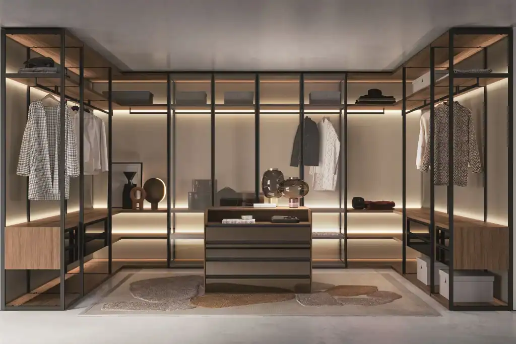Spacious walk-in closet featuring wooden shelves, hanging space, and ambient lighting for organized.