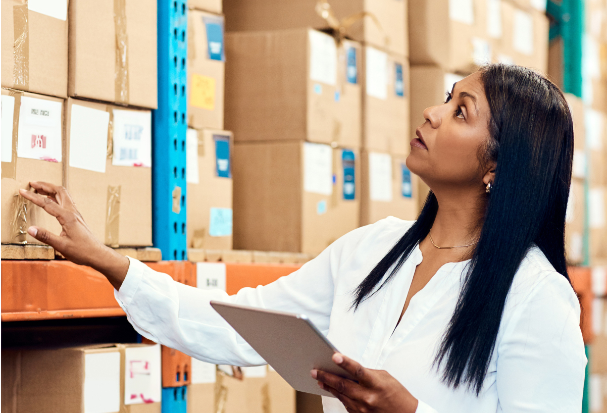 Employee in a Uniform Distribution Warehouse