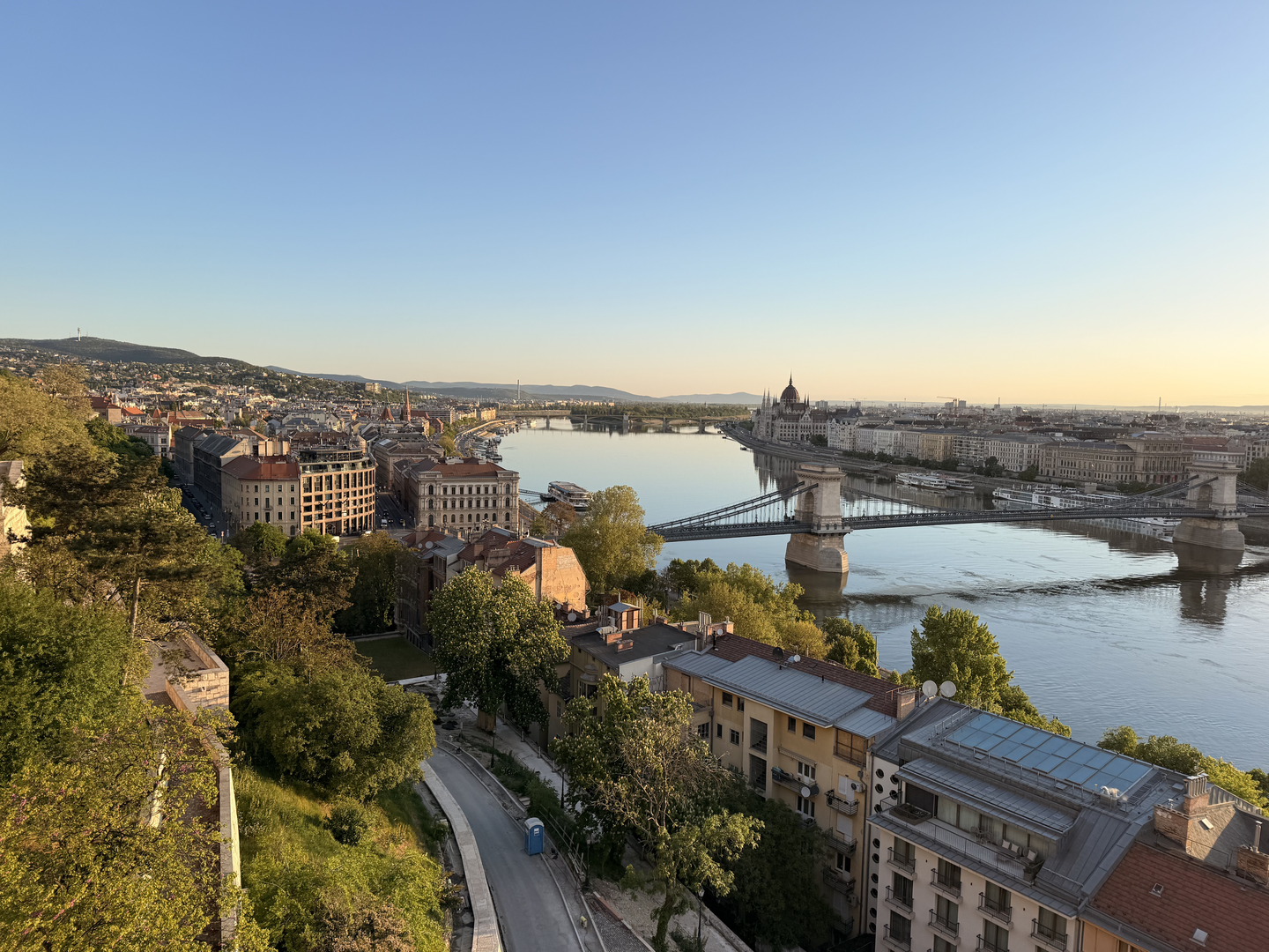 Budapest at warm summer evening — Parliament and Danube illuminated