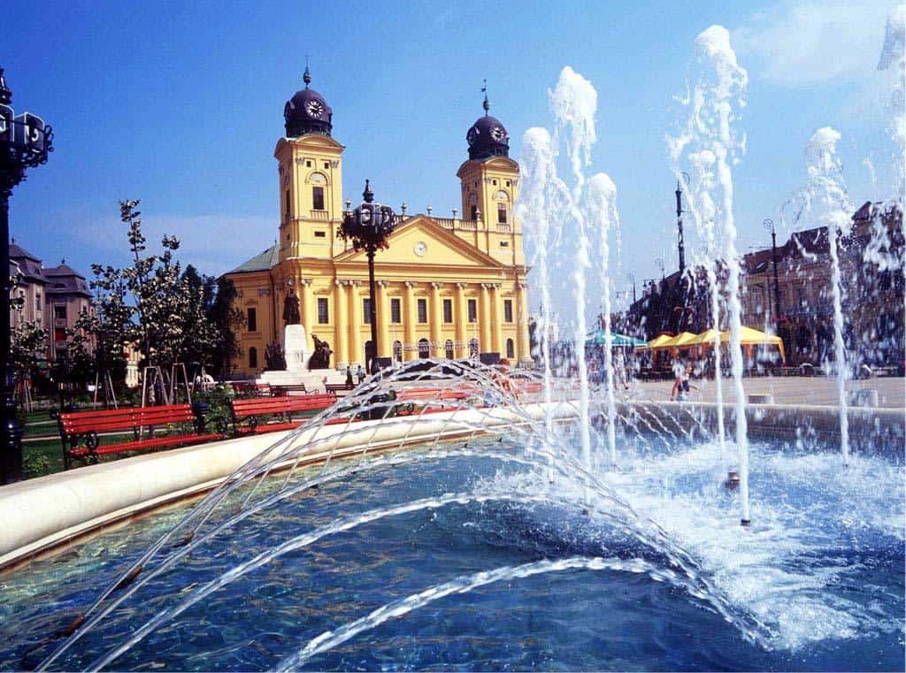 Debrecen Great Reformed Church with fountain on Kossuth Square