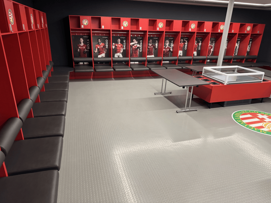 Red lockers around the national-team dressing room at Puskás Aréna.