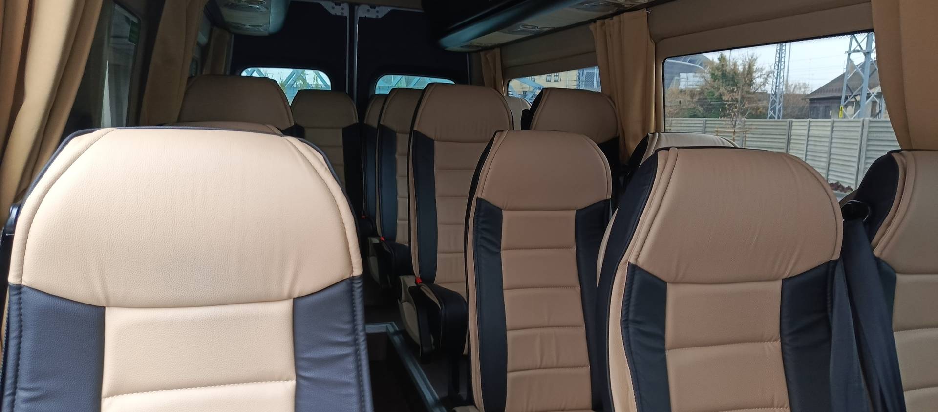 Cream and navy headrests in close detail