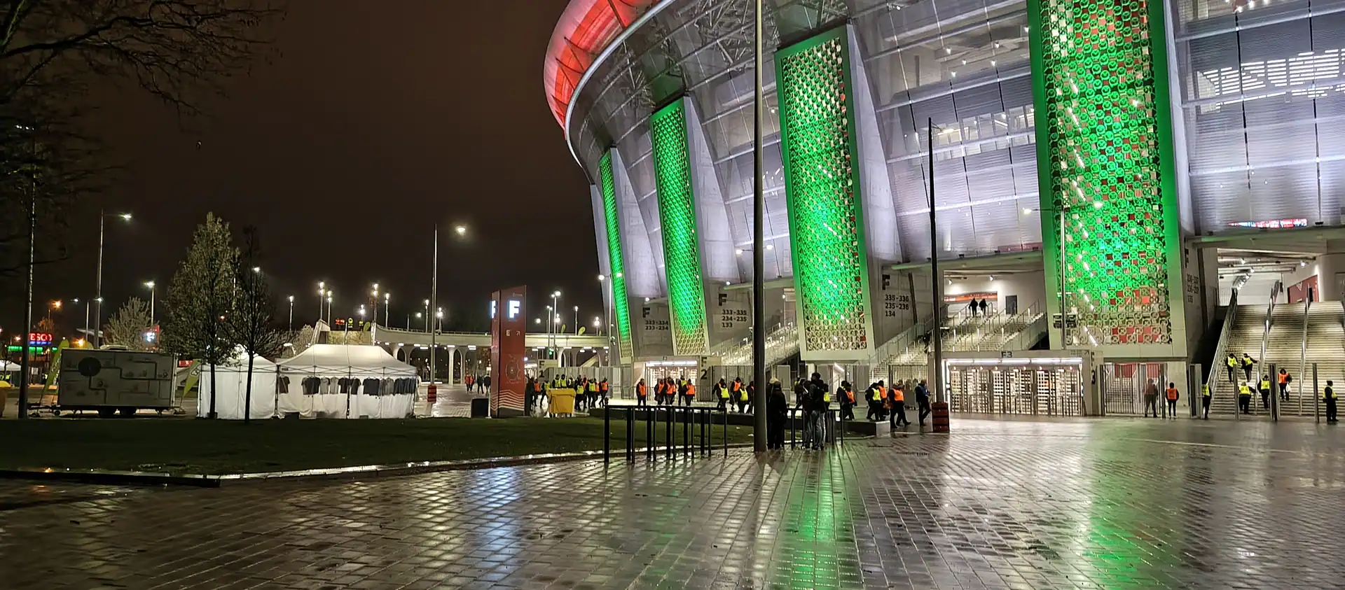 Puskás Aréna illuminated at night — Champions League Final 2026 Budapest evening atmosphere
