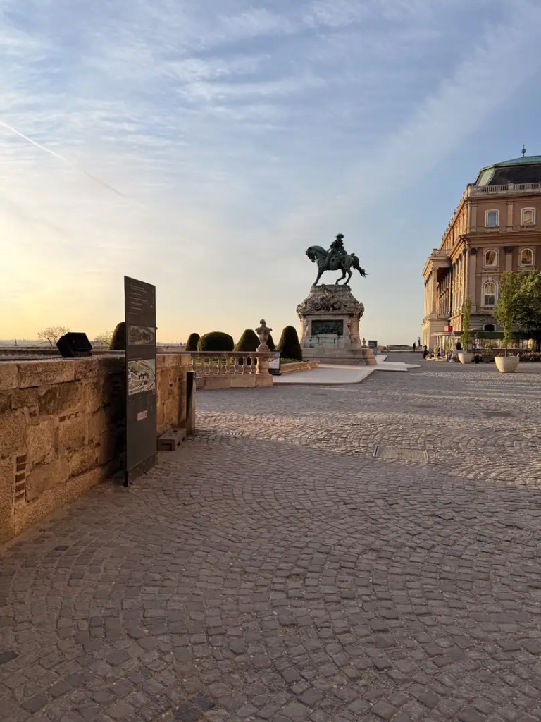 Equestrian statue and paved terrace beside the Royal Palace on Budapest’s Castle Hill