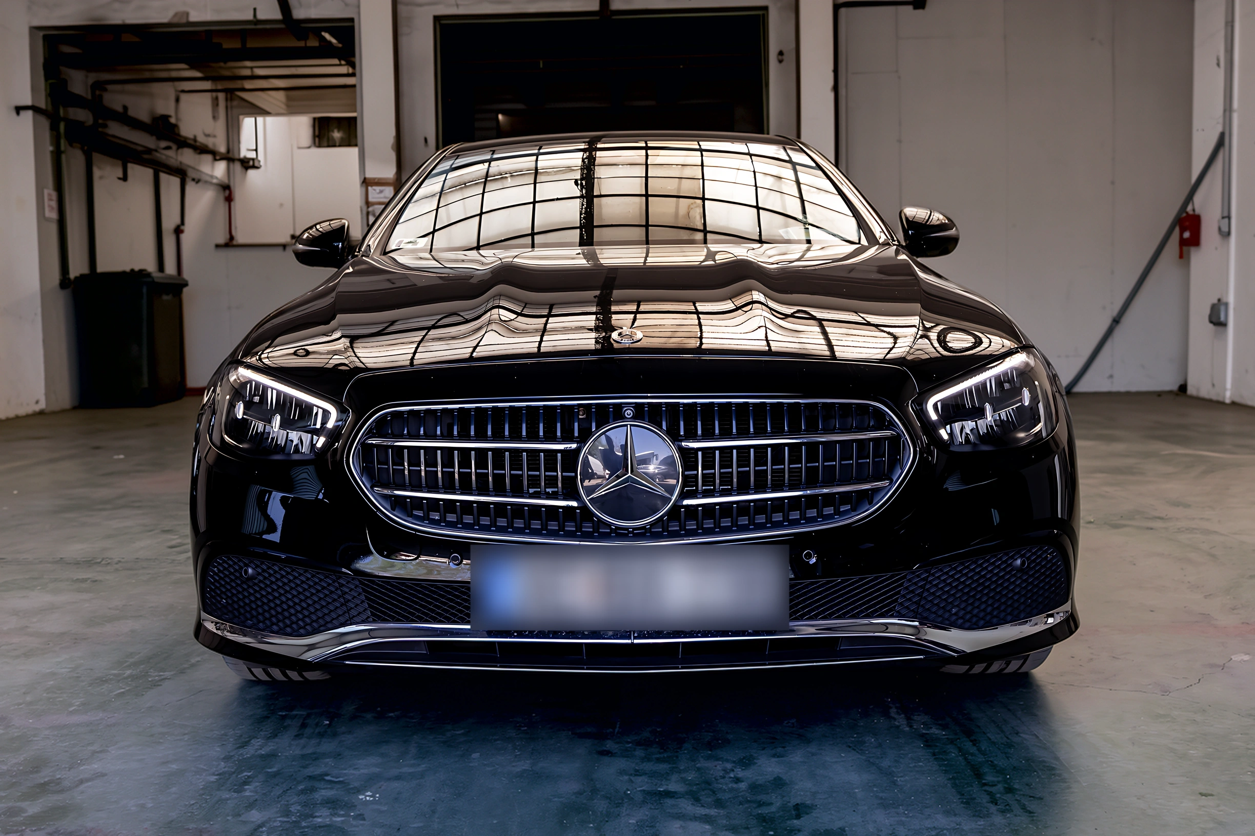 Mercedes E-Class on location — Budapest city backdrop for VanBudapest airport chauffeur service