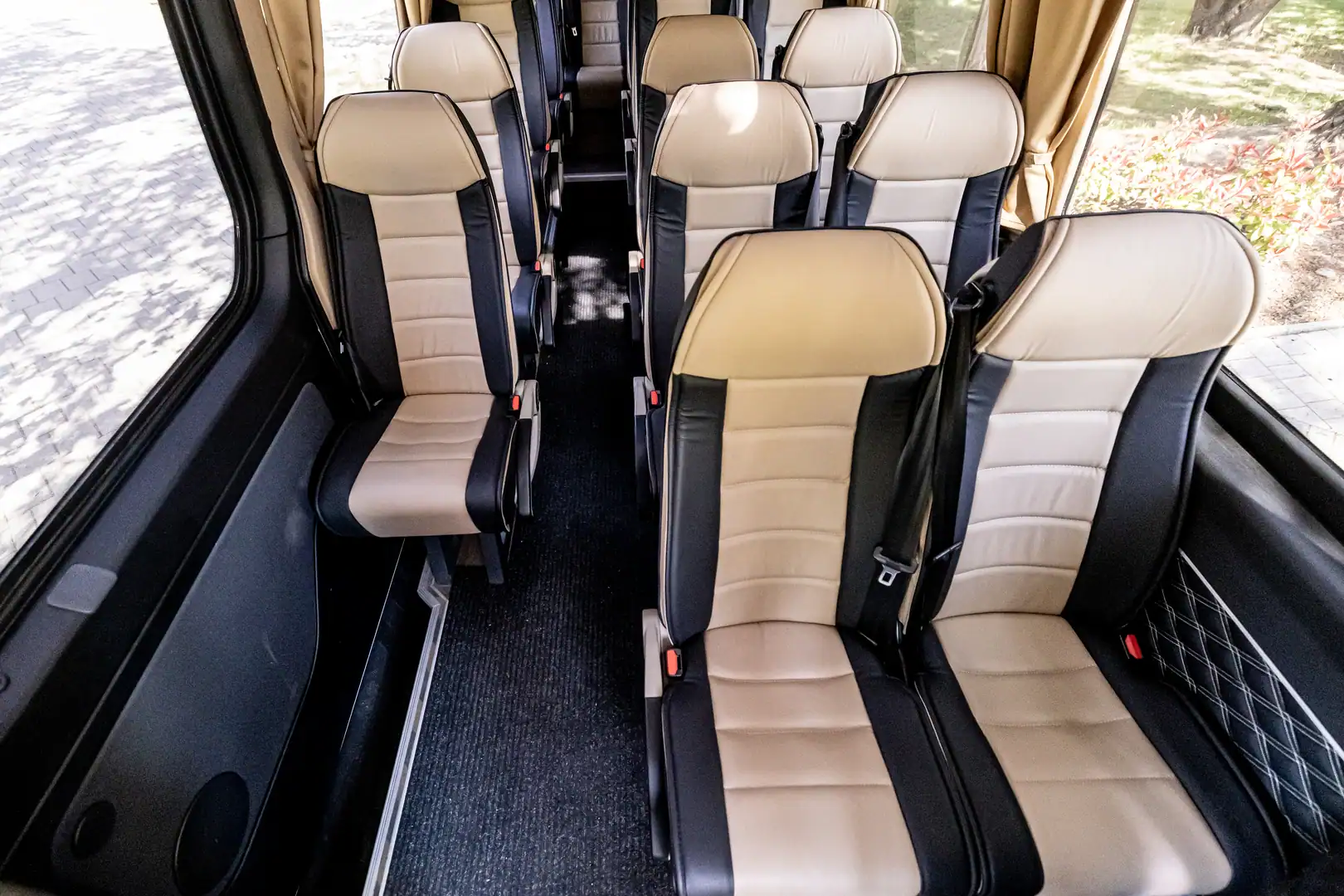 Diamond-stitched seat panels in cream and black leather