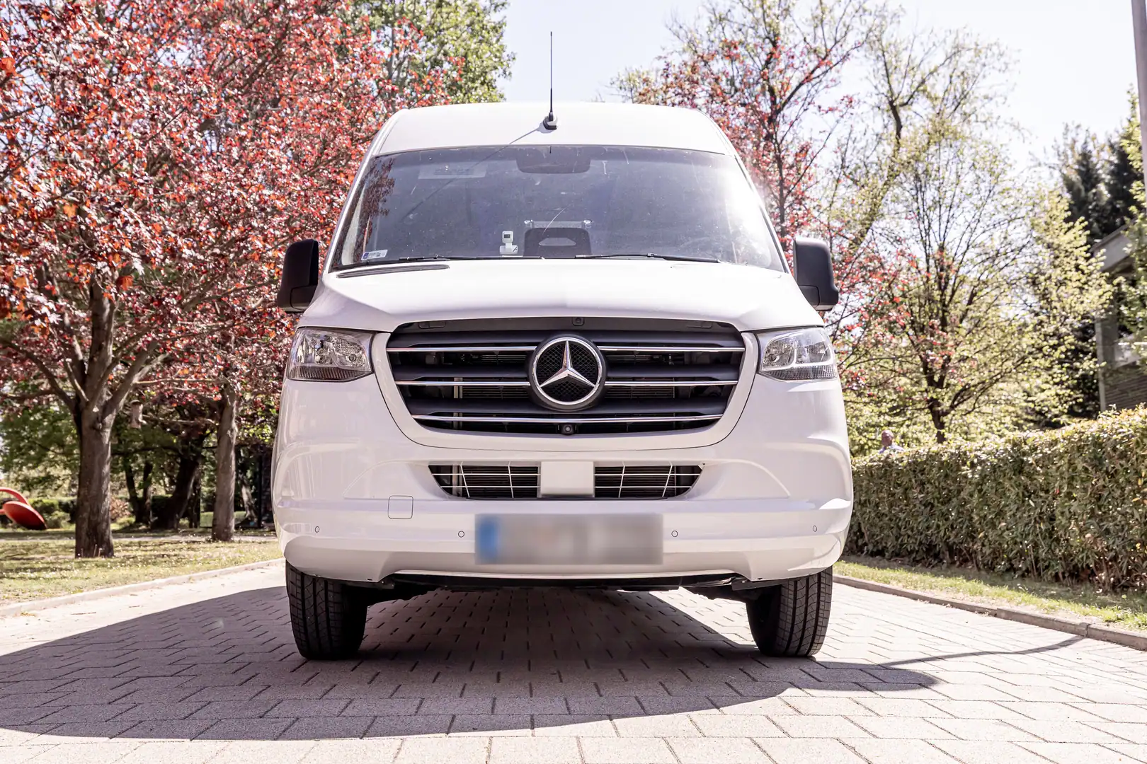 A clean, head-on front view of the Sprinter