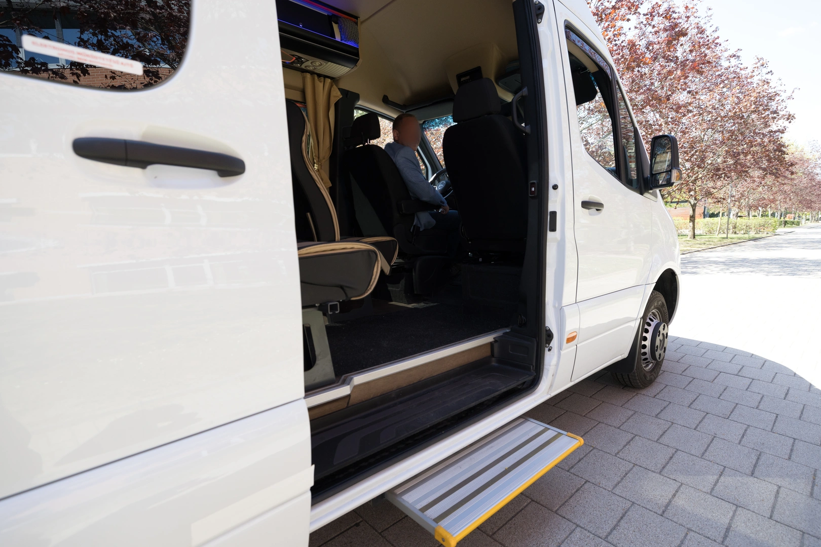 Open side door with the boarding step in place