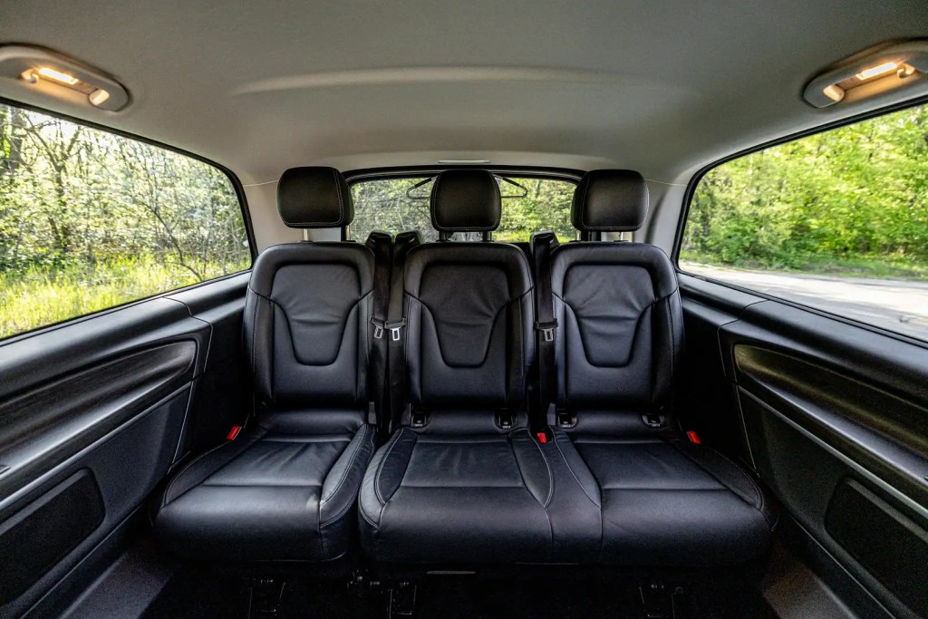 Black leather passenger seats and windows inside a Mercedes-Benz V-Class