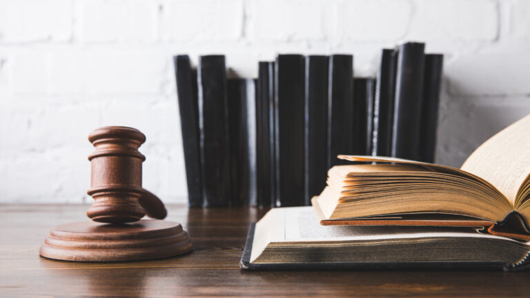 Investor reviewing documents during the FINRA arbitration process for securities disputes
